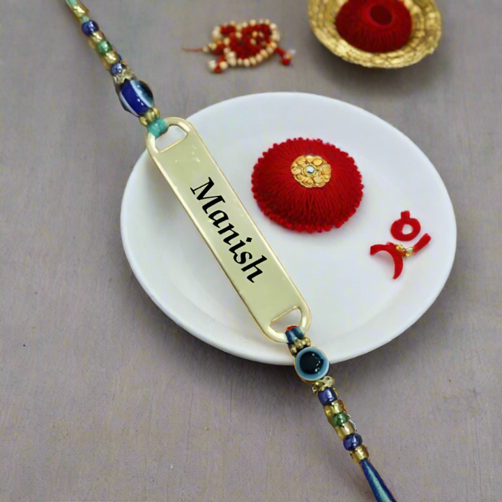 Show your love with a personalized Evil Eye Rakhi! Add your brother's name for a special touch.