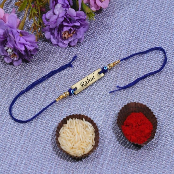 Personalized Evil Eye Rakhi for Raksha Bandhan with intricate design and space for brother's name. (Zestpics)