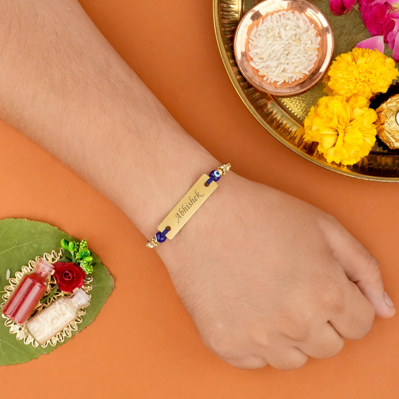  Celebrate Raksha Bandhan with a personalized Evil Eye Rakhi for protection and good luck.