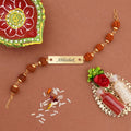 Elegant Metal Rudraksha Rakhi with Custom Name | Zestpics