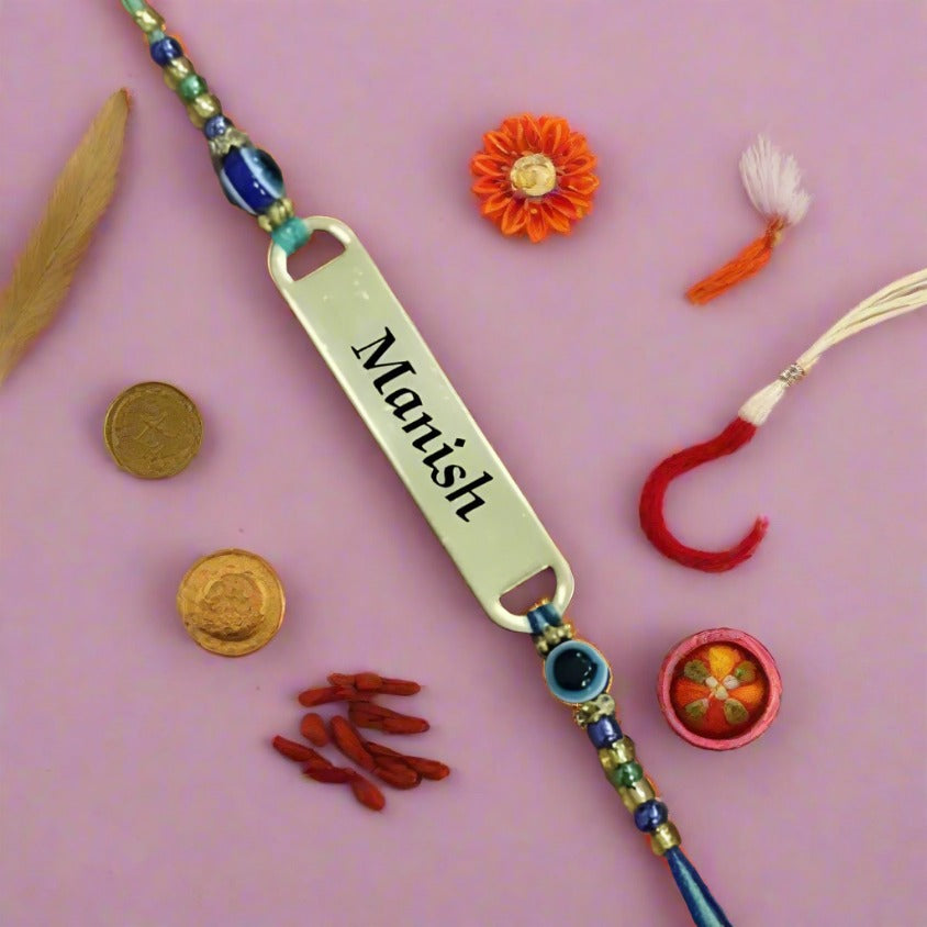 Evil Eye Rakhi with a modern twist - personalized with name for a unique Raksha Bandhan gift.