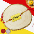 Personalized name gold acrylic rakhi is a luxurious and elegant gift for Raksha Bandhan. Made from high-quality gold acrylic, this rakhi features your loved one's name engraved in a beautiful font. Available in a variety of colors and styles, our gold acrylic rakhis are sure to make a statement. Order yours today! Zestpics