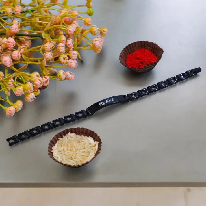 Trendy black Rakhi bracelet with name engraving – modern personalized gift for brother by Zestpics