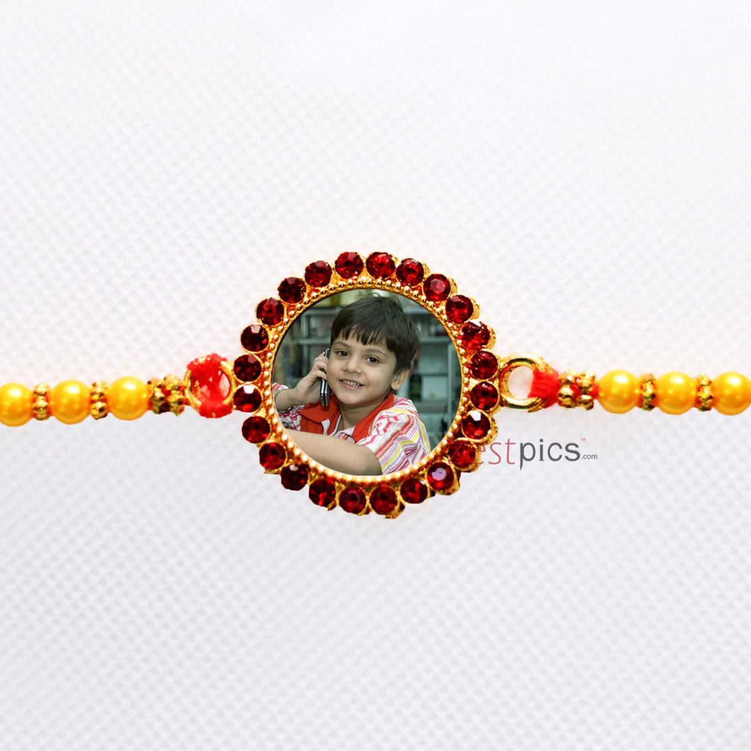 This Raksha Bandhan, Adorn His Wrist with a Fiery Bond: Personalized Red Stone Round Shape Photo Rakhi | Zestpics
