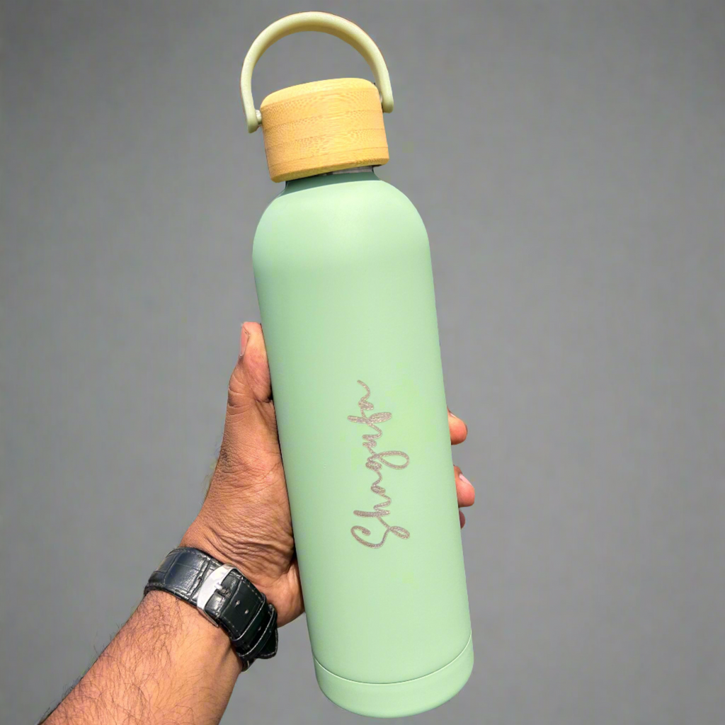 Personalized Fossil Flask: Stainless steel water bottle with wooden lid, keeps drinks hot or cold for hours. (Zestpics)