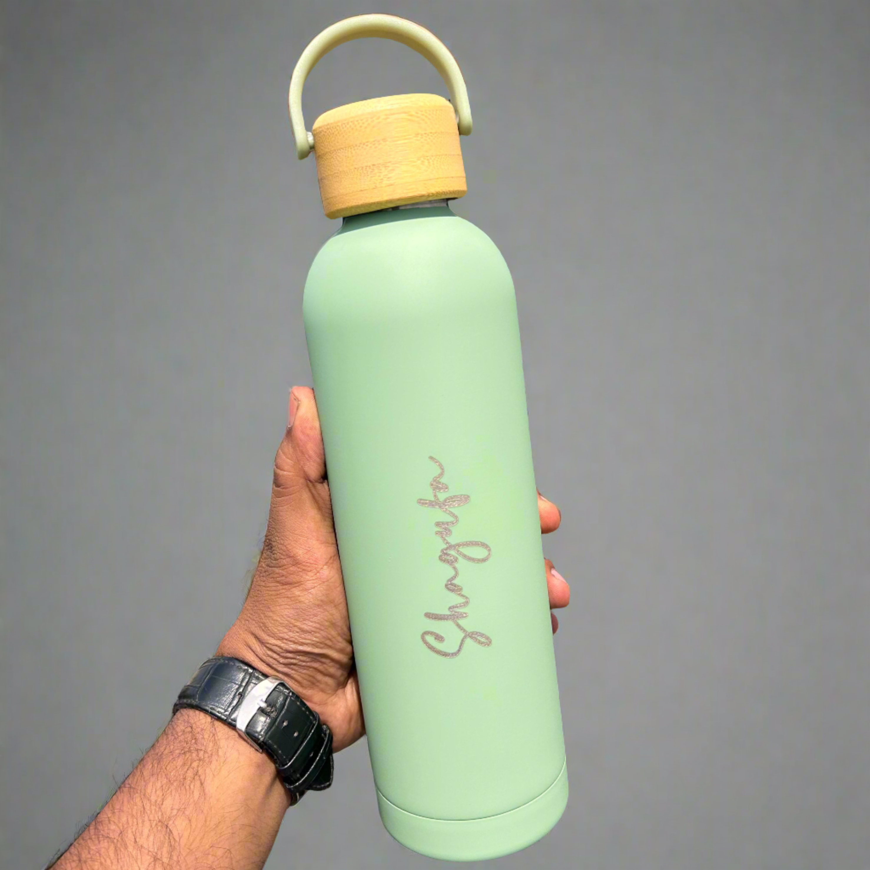Personalized Fossil Flask: Stainless steel water bottle with wooden lid, keeps drinks hot or cold for hours. (Zestpics)