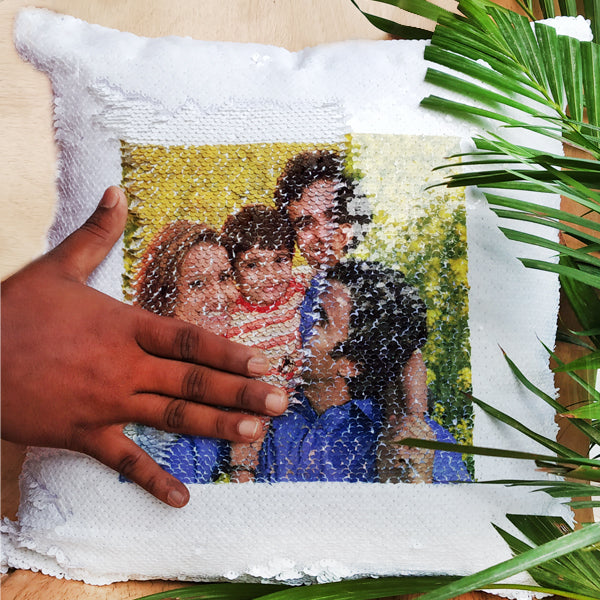 These magic pillows are a layer of sequins with an image printed on one side, by moving the sequins one way the image is hidden and a quick swipe the other way reveals the image! The white side contains the image and the other color is when the image is hidden